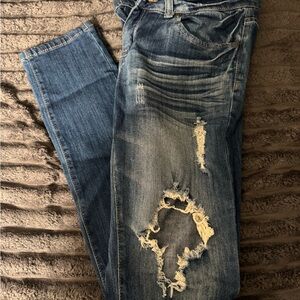 Distressed Blue Jeans